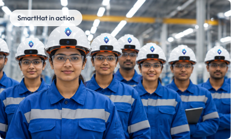 A team of workers in blue overalls and white SmartHat helmets, tagged SmartHat in action